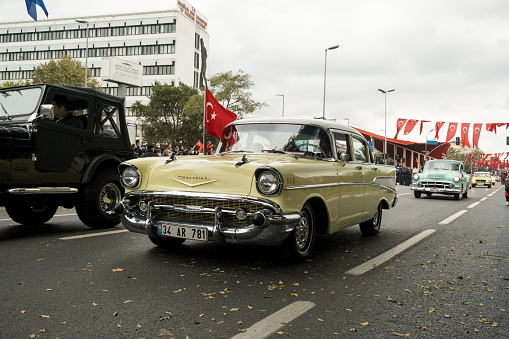 Istanbul, Turkey - October 29, 2021: Front view of a yellow 1955 Chevrolet 210 on October 29 republic day of Turkey, Classic car parade moment.