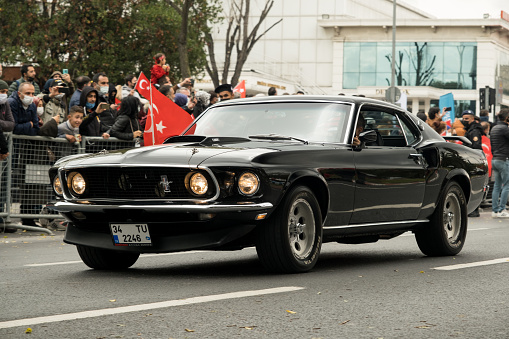 Istanbul, Turkey - October 29, 2021: Front view of a  black 1965 Ford Mustang GT 350 on October 29 republic day of Turkey, Classic car parade moment.