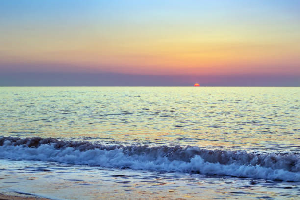 Sunrise in Torremolinos, Spain View of sunrise with sea in Torremolinos, Spain torremolinos beach stock pictures, royalty-free photos & images