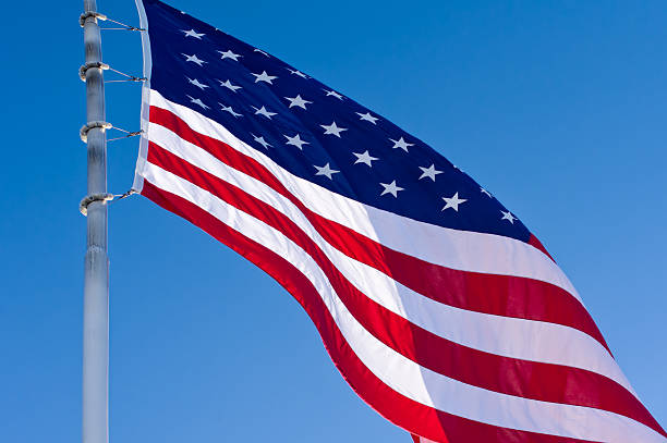 istock American Flag and Blue Sky 136255531