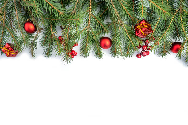 istock coniferous tree branches with gifts and Christmas balls.on a white background. isolated object. 1362556478