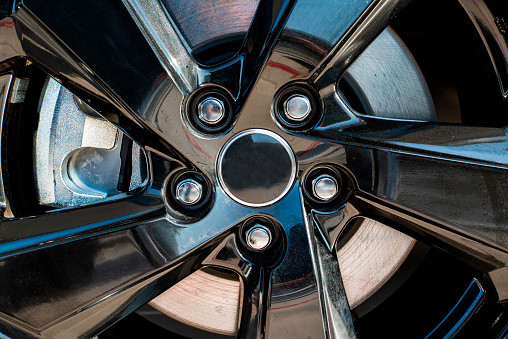 alloy black steel wheels close up. Car background.