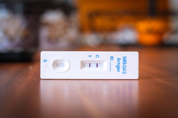 istock on a table there is a positive Corona rapid test 1362558631