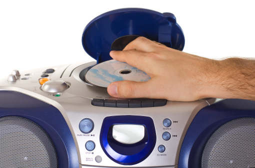Cd Add Instrument Image Inserting A Disk Into Cd Player Stock Photo - Download Image Now ...