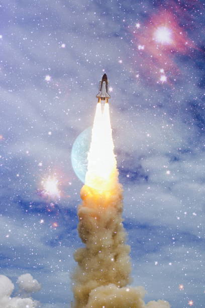 istock Spaceship takes off into the starry sky. Rocket starts into space. Concept , Elements of this image furnished by NASA 1362564776