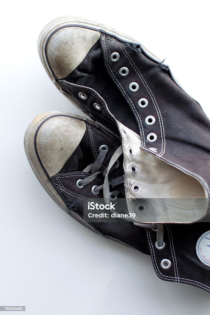 old friends very old and abused sneakers Canvas Shoe Stock Photo