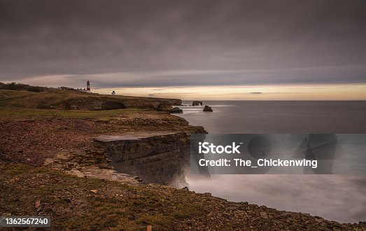 istock The view along Marsden Bay near Sunderland, of the cliffs and the Sandstone Sea stacks, as the tide comes in 1362567240