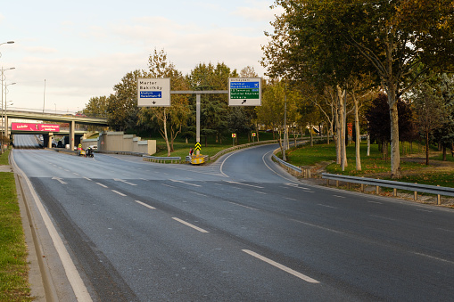 White truck under overpass road