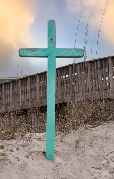 A Cross placed on the Beach A cross is placed on the beach at the entrance to Emerald Isle Beach emerald isle north carolina stock pictures, royalty-free photos & images