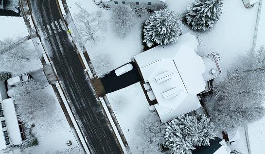 Aerial view of a freshly snow covered neighborhood.