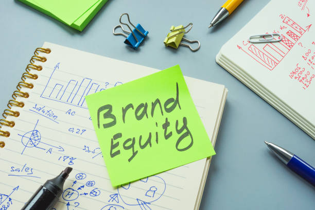 istock Brand equity mark and open notepad with calculations. 1362572177