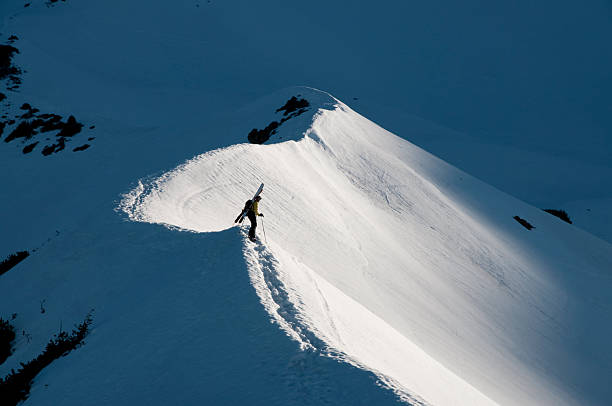 Mt. Shasta mountaineering Early morning scene of climber on Green Butte ridge route - Mt. Shasta, CA, USA mt shasta stock pictures, royalty-free photos & images