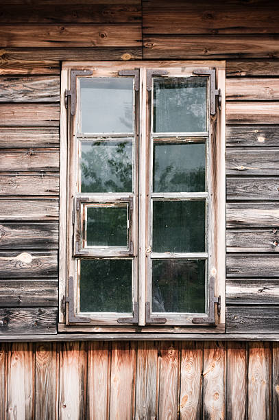 istock Old window in wooden cottage 136257509