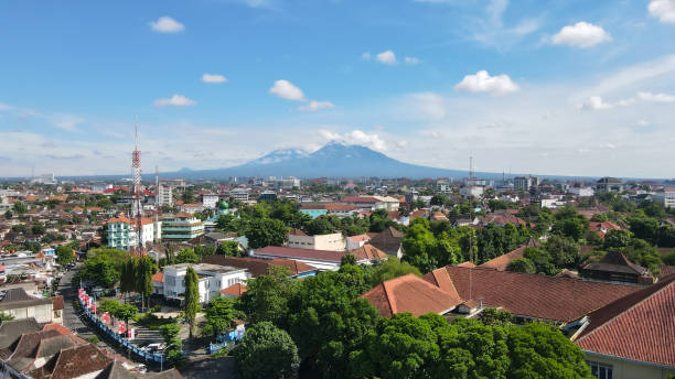 Aerial view, the morning view of the city of Yogyakarta and the magnificent Mount Merapi. Aerial view, the morning view of the city of Yogyakarta and the magnificent Mount Merapi. yogyakarta stock pictures, royalty-free photos & images