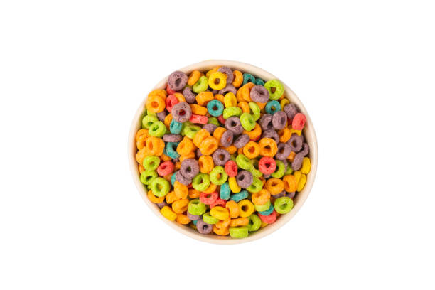 istock Colorful rings cereal spill out into a bowl. Breakfast. Isolated. 1362579687