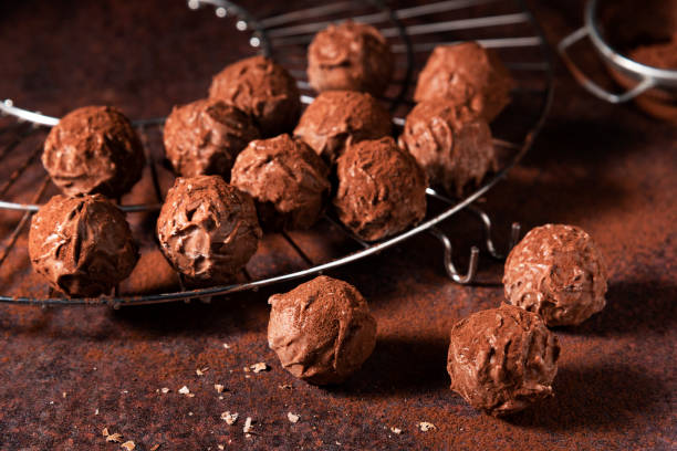 istock Chocolate Truffles on a brown background stock photo 1362579968