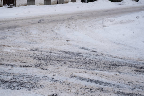 istock Slippery snowy city road  during winter. 1362581253