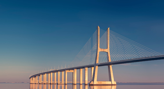 Puente Vasco da Gama al atardecer en Lisboa, Portugal photo