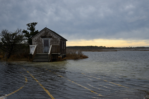 A Ranger Station on the assateague island national seashore is almost flooded as the tides keep getting higher and higher due to climate change