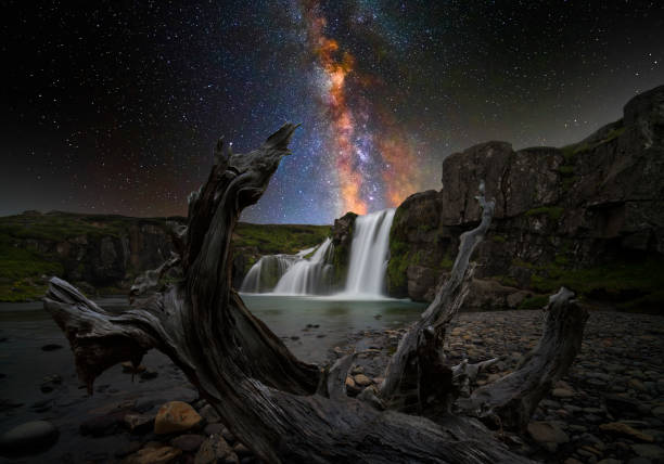 istock Colorful waterfall with milky way 1362589628