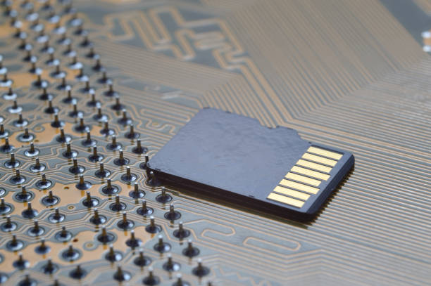 istock the black micro sd card lies on the microcircuit. close-up. 1362590621