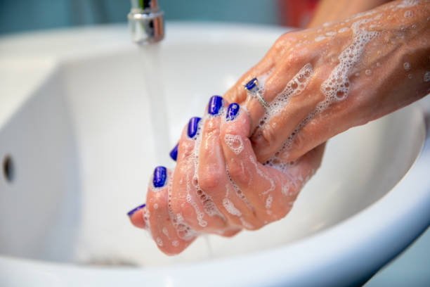 Woman washing hands