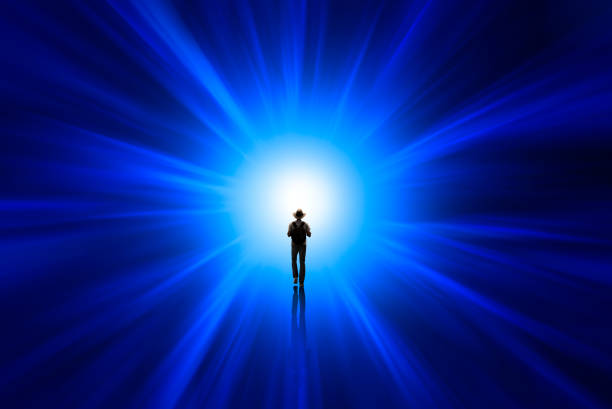 istock Man walking towards the light 1362591738