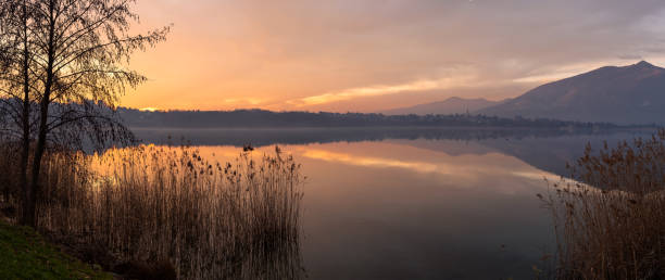 istock Sunset over the lake with beautiful sky and landscape reflections 1362598484