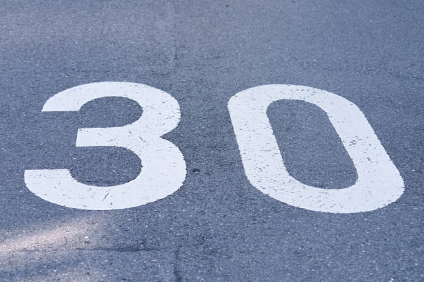 istock Speed limit 30 sign painted on the road 1362600849