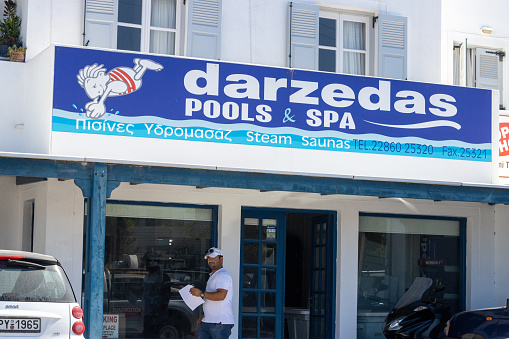 Darzedas Pools & Spa near Firá on Santorini, Greece, with people outside