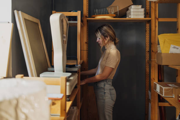 istock Pretty Female Entrepreneur Working at Her Storage Facility 1362601742