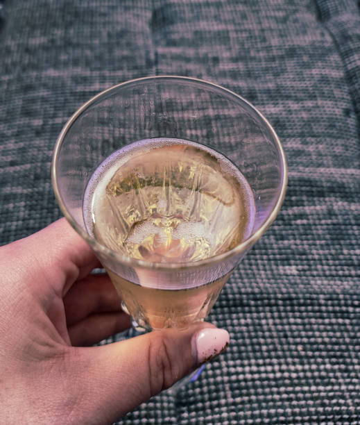 istock Champagne glass in hand 1362604447