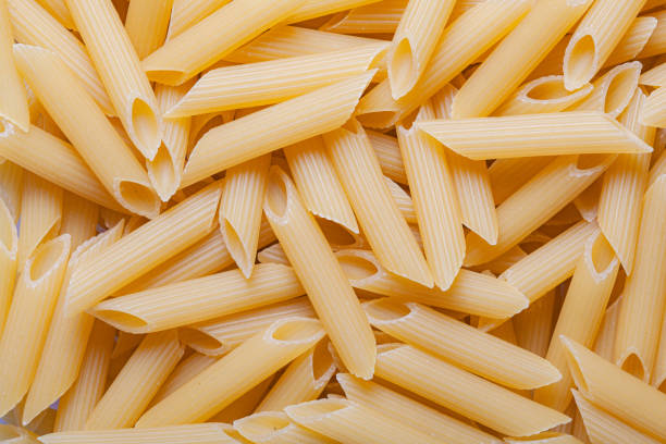 istock texture of raw pasta feathers top view 1362606640