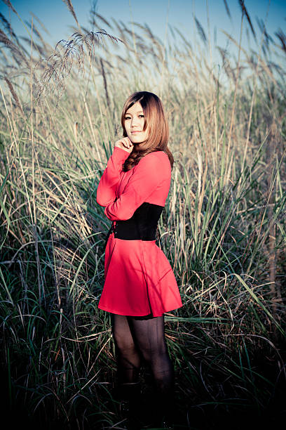 istock Young beautiful asian woman in nature 136260751