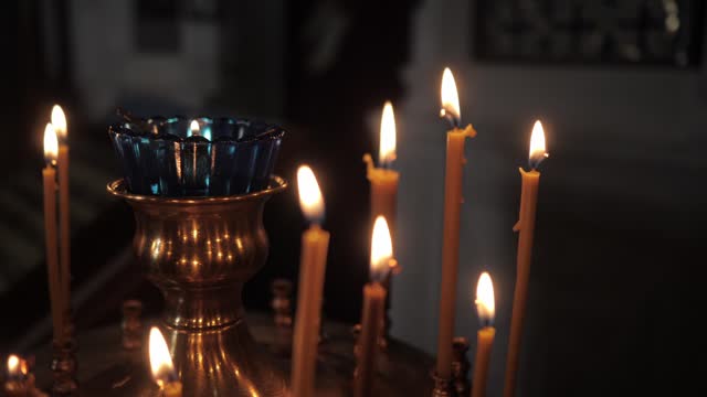 Burning candles in the church church.