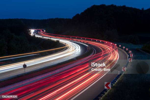 Car Light Trails On Highway At Night Stock Photo - Download Image Now - Transportation, Driving, Business