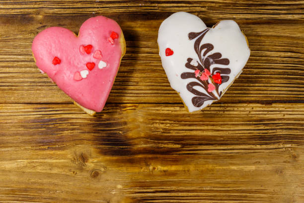 heart shaped cookies on wooden table. top view, copy space. dessert for valentine day - 3675 imagens e fotografias de stock