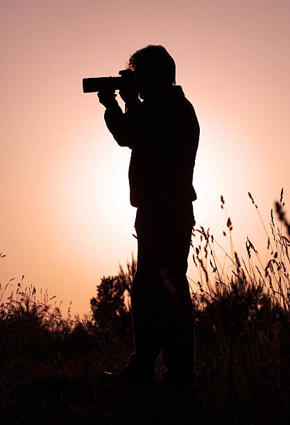 istock Silhouette of a photographer 136261599