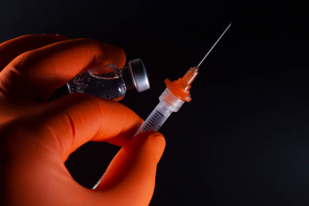 istock Covid-19 vaccine and Disposable syringe 1362618174