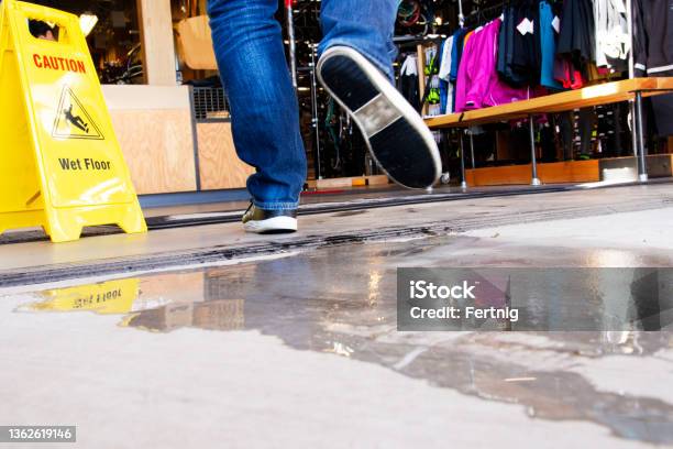 Wet Floor In A Retail Store Stock Photo - Download Image Now - Store, Flooring, Tripping - Falling