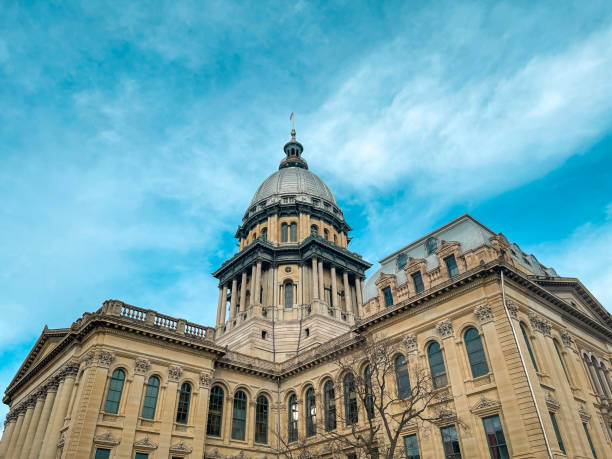 Rear View of the Illinois State Capitol Building in Springfield, IL USA. The Capitol dome stands tall against a winter afternoon cloudscape. Illinois State Capitol Building in Springfield, Illinois. springfield illinois skyline stock pictures, royalty-free photos & images