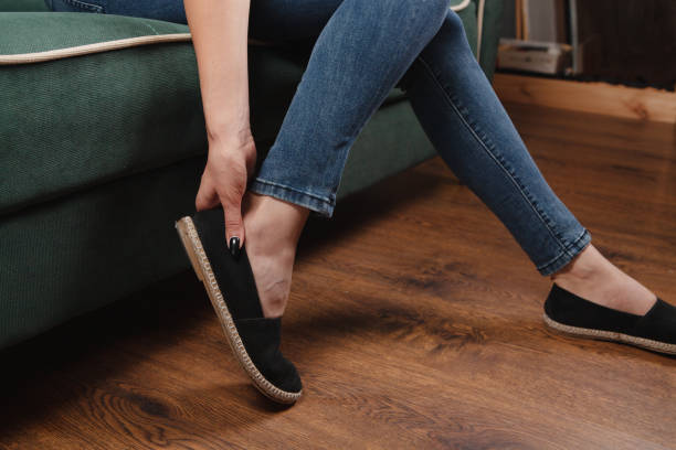 istock a woman has a sore ankle leg 1362620854