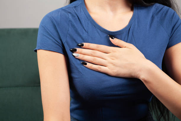 istock young woman has chest pain 1362620868