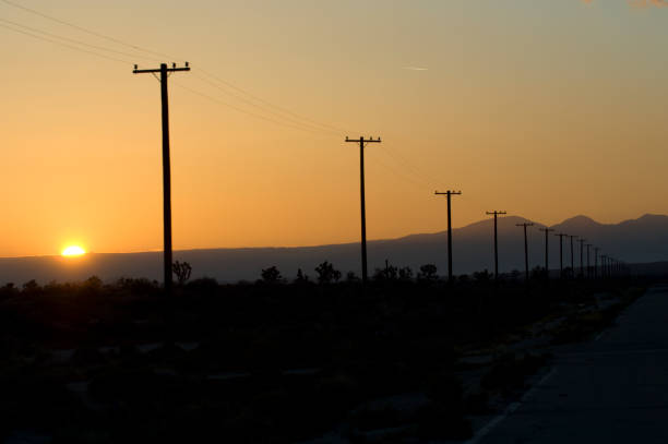 istock Sunset with telephone poles 1362621145