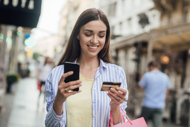 istock Young woman making an order on the move 1362622573