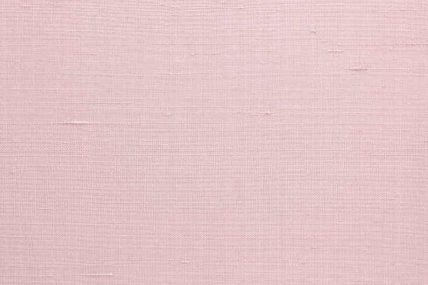 istock Silk fabric wallpaper texture pattern background in light pale sweet pink rose color 1362625658