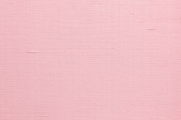 istock Silk fabric wallpaper texture pattern background in light pale sweet pink rose color 1362625663