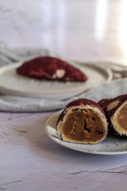 Korean Sweet Potato Mochi Bread made from mochi bread with Purple Sweet Potato inside. Food photography concept for background.