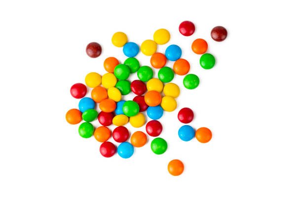 istock A Pile of Rainbow Colored Candy Coated Chocolate Buttons Isolated 1362625770