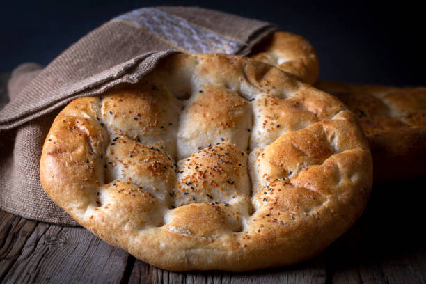 istock Ramadan Pita (Turkish name; Ramazan Pidesi) Traditional Turkish bread for holy month Ramadan 1362626581